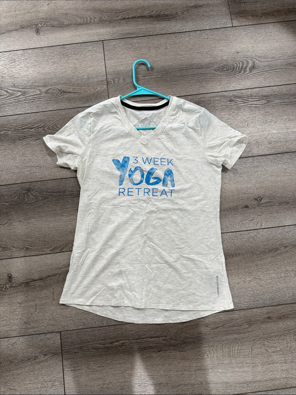 Beachbody White V-Neck '3 Week Yoga Retreat' Tee with Blue Graphic